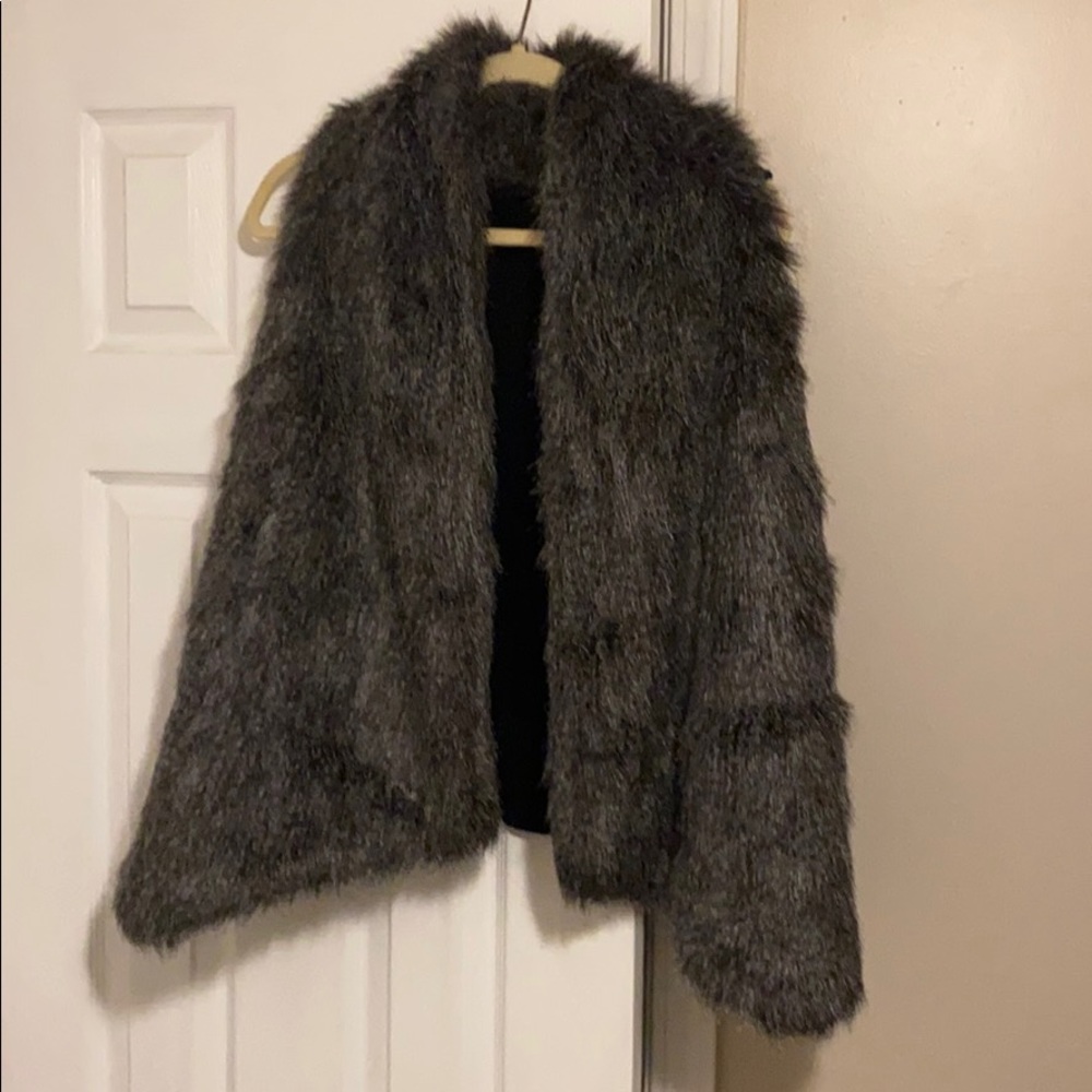 A faux fur dark gray/brown/black vest